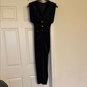 Elegant Black Sleeveless Dress with Gold Buttons